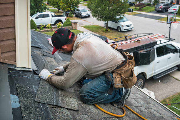 Professional Roof Leak Repair technician working in North Marshfield, MA
